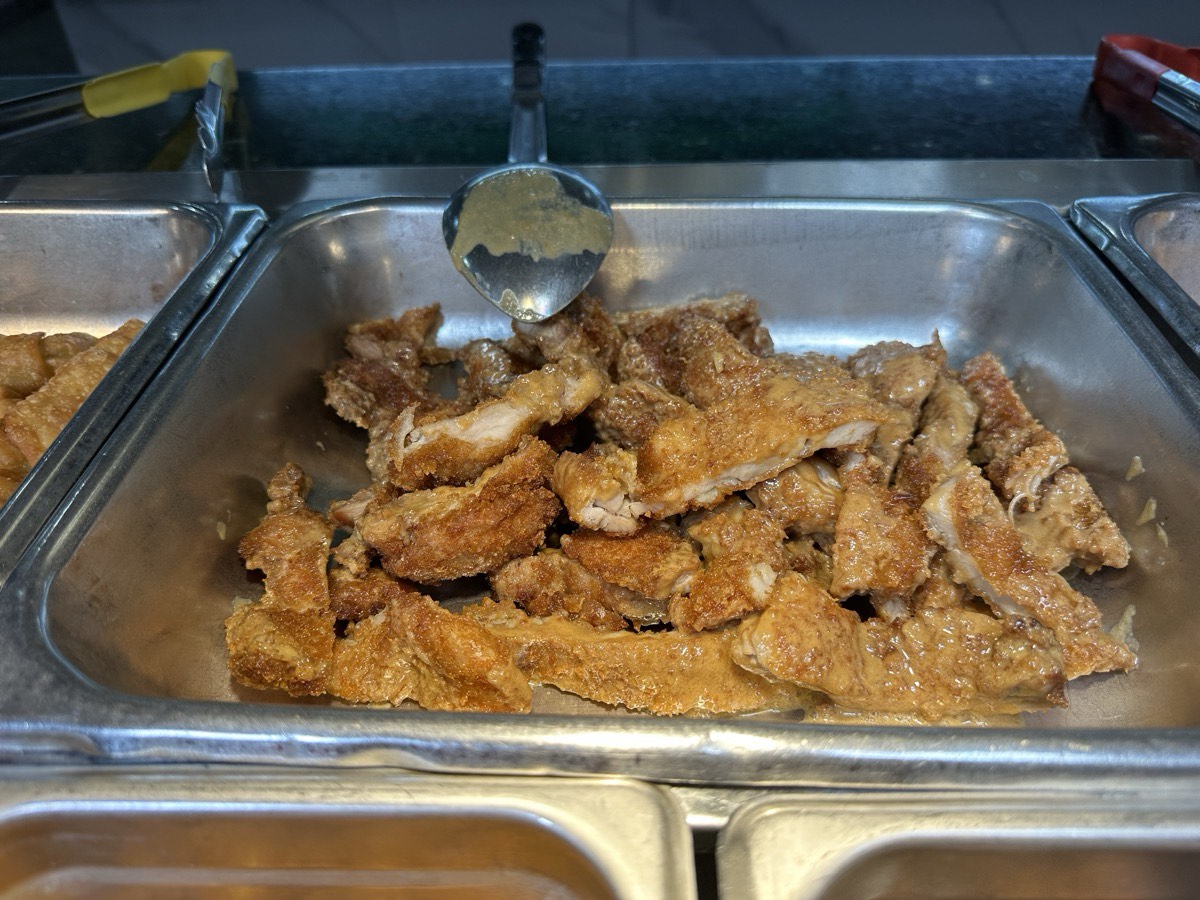 A tray of crisp breaded fish strips