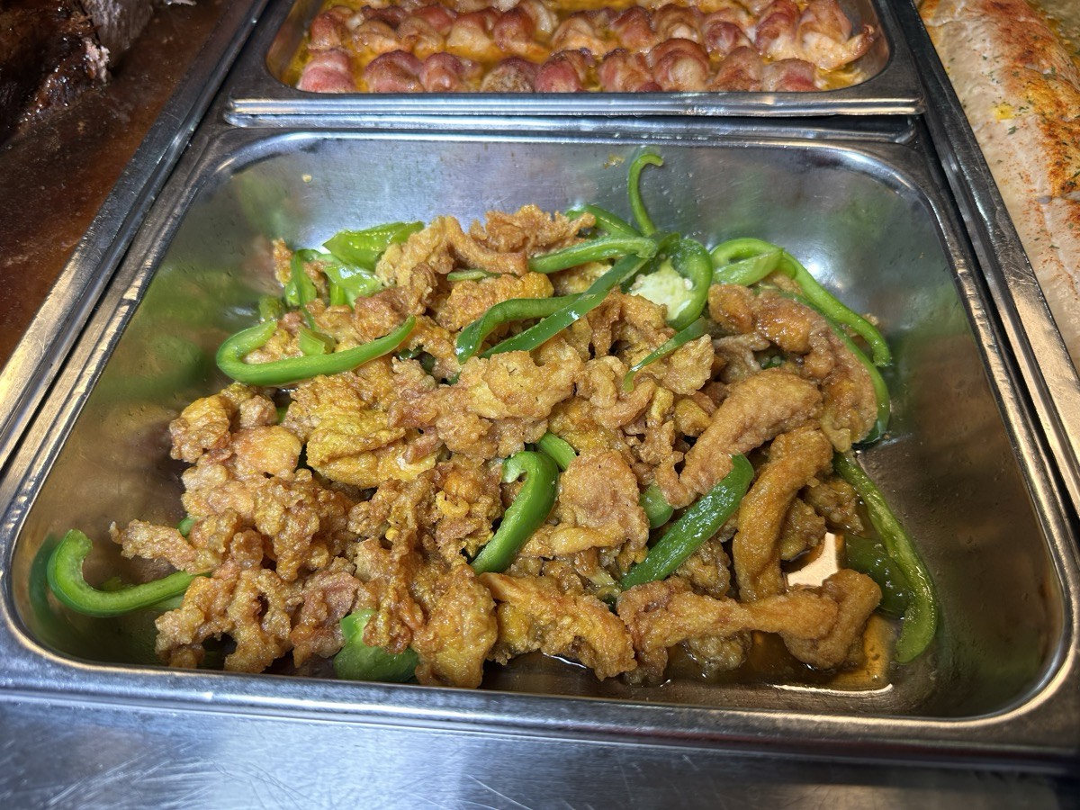 Sliced beef stir-fried with green peppers and onion