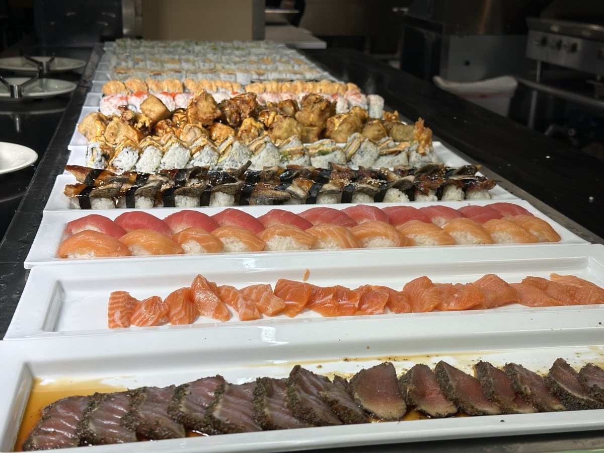 The sushi bar at Jade Asian Buffet Long rows of nigiri and sushi rolls laid out along the sushi bar at Jade Asian Buffet