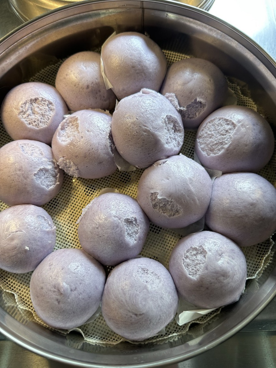 Taro buns A steamer of purple taro buns